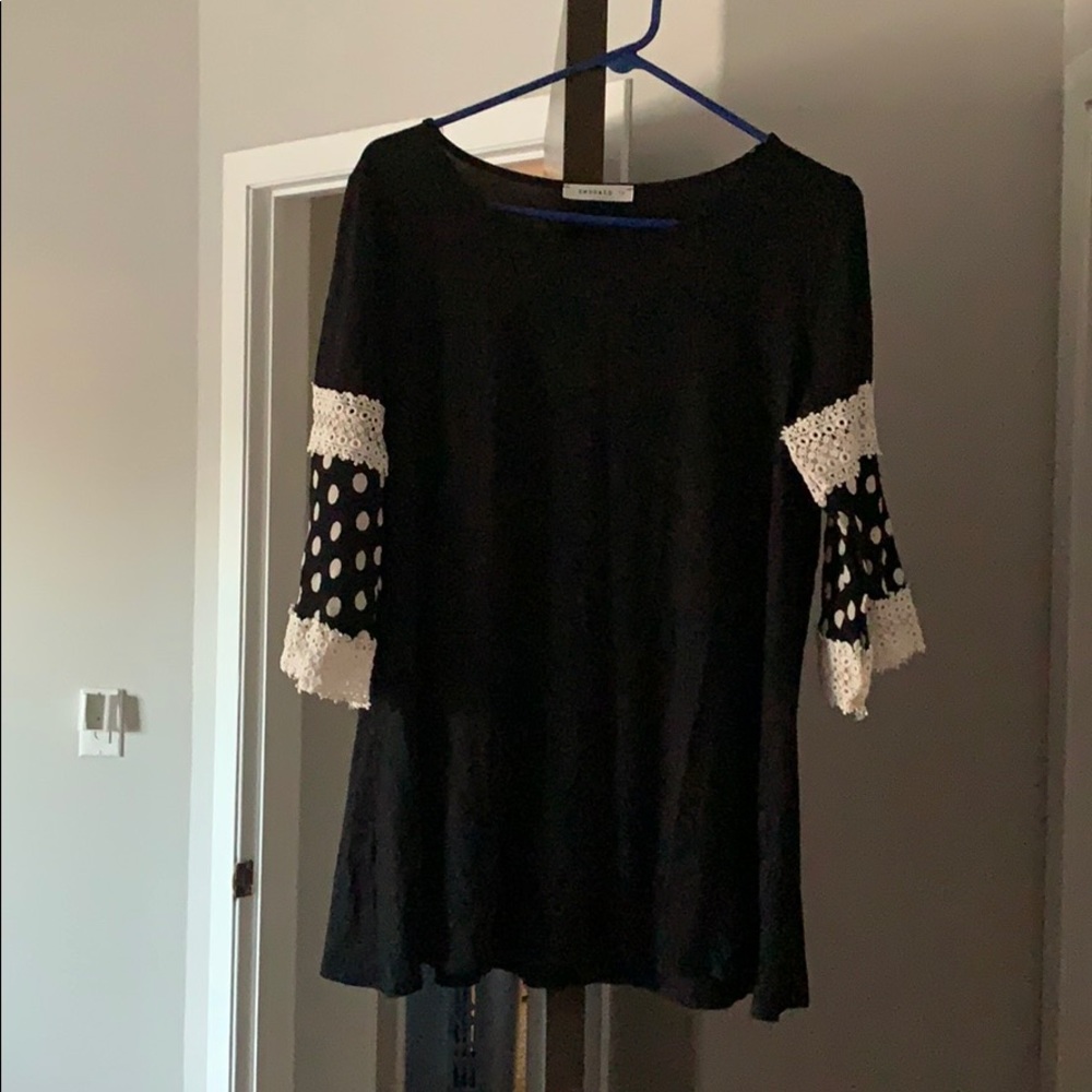 Black shirt with polka dot sleeves